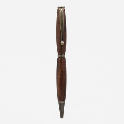 Handcrafted wooden pen, showcasing the natural beauty and warmth of fine wood grain for an elegant and timeless writing experience.